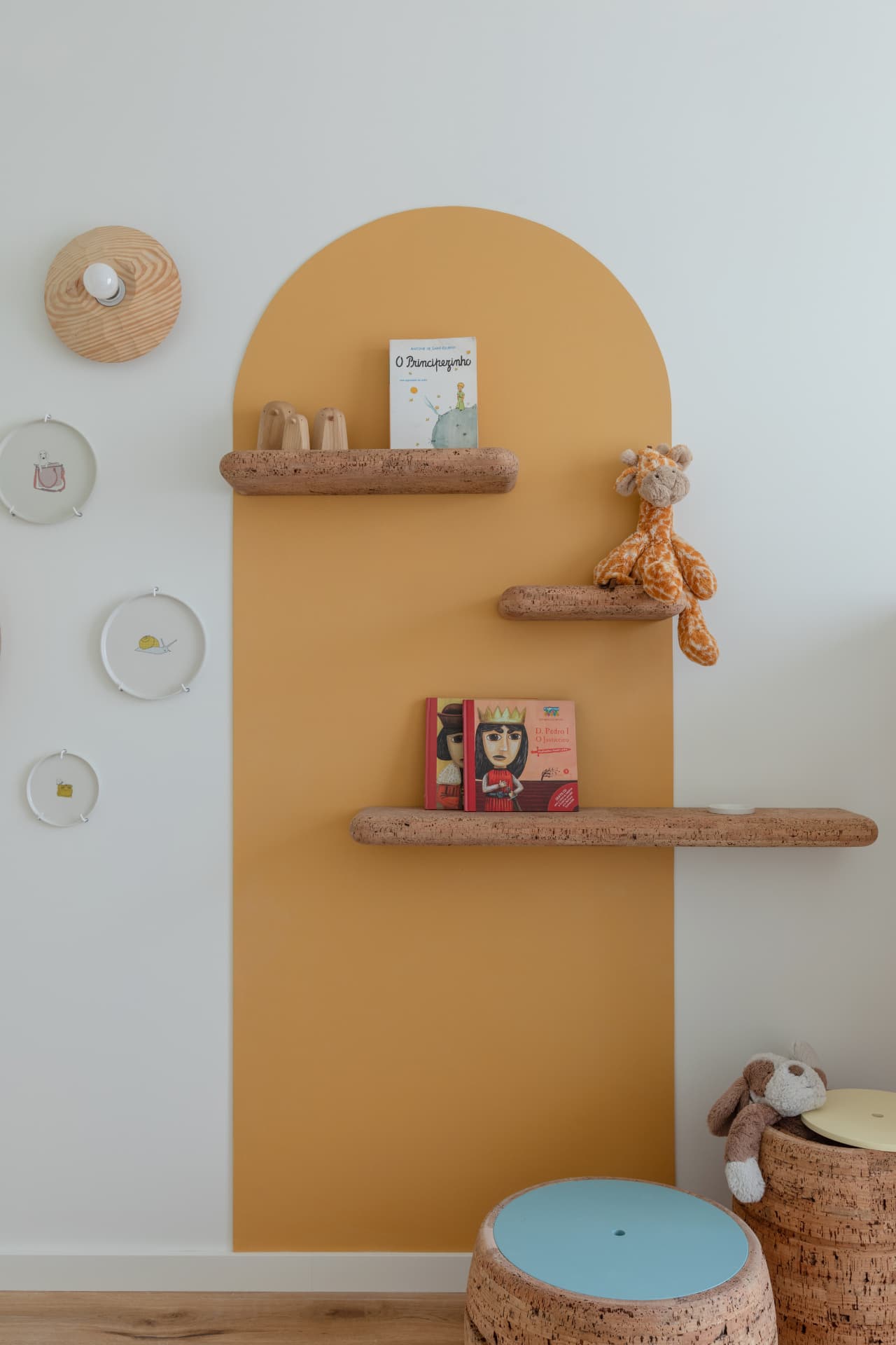 Cork wall shelves and cork stools in a children's room