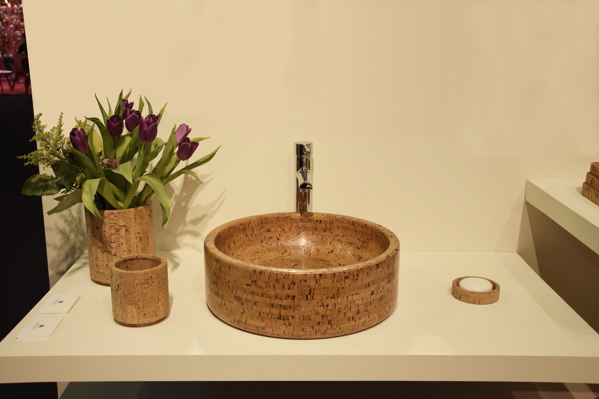 Cork washbasin, vase and soap dish in a bathroom setting